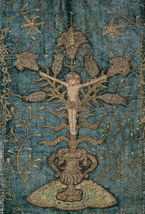 Crucifix picture on blue medieval vestment